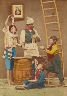Unidentified man with moustache making pasta, three boys either eating it or helping..., 1865-1870. Creator: Giorgio Conrad