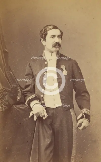 Unidentified man with moustache standing, wearing a medal on his lapel, about 1861. Creator: Bayard & Bertall.