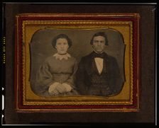 Unidentified man and woman, half-length portrait, seated, ca. 1855. Creator: Francis Grice