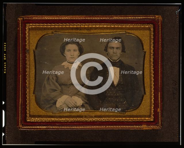 Unidentified man and woman, half-length portrait, seated, ca. 1855. Creator: Francis Grice.