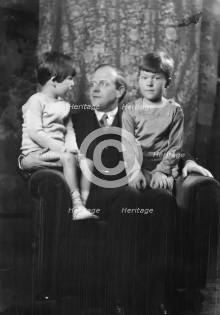 Unidentified man and two children, portrait photograph, between 1911 and 1942. Creator: Arnold Genthe.