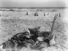 Unidentified man and two women at Long Beach, New York, between 1911 and 1942. Creator: Arnold Genthe