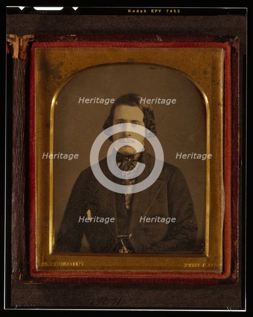 Unidentified man, half-length portrait, seated, facing front, between 1848 and 1860. Creator: Montgomery Simons.