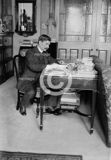 Unidentified man seated at desk, between c1915 and c1920. Creator: Bain News Service.