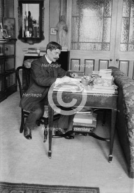 Unidentified man seated at desk, between c1915 and c1920. Creator: Bain News Service.