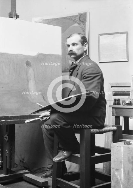 Unidentified man, seated at his easel, portrait photograph, between 1896 and 1942. Creator: Arnold Genthe.