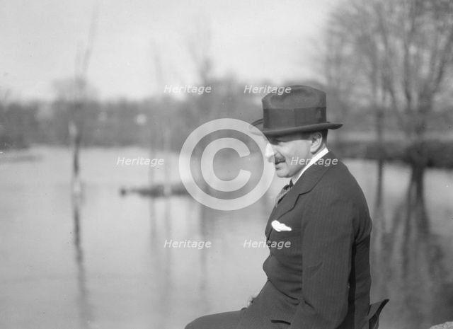 Unidentified man, seated outdoors, between 1896 and 1942. Creator: Arnold Genthe.