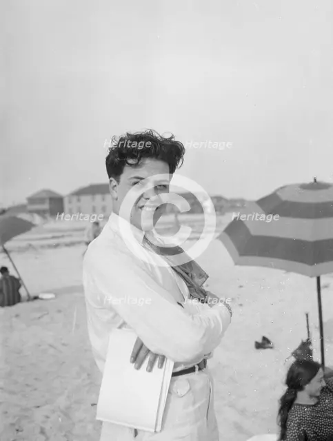 Unidentified member of the Albert Rothbart group at the beach, between 1920 and 1935. Creator: Arnold Genthe.