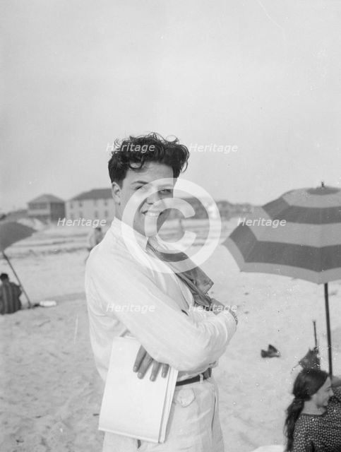 Unidentified member of the Albert Rothbart group at the beach, between 1920 and 1935. Creator: Arnold Genthe.