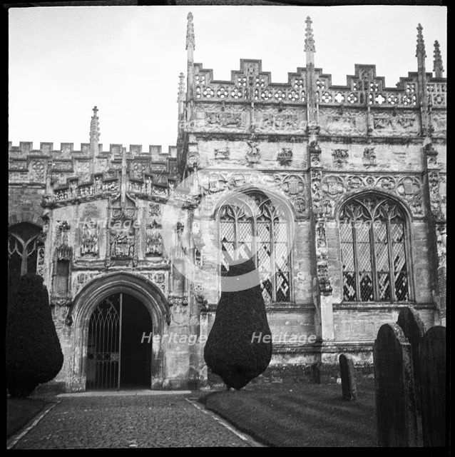 Unidentified church with a highly decorated porch and perforated parapet, England, 1940-1962. Creator: Ethel Booty.