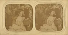 Unidentified couple: bearded man holding a single piece of fruit with a woman holding..., about 1865 Creator: Unknown