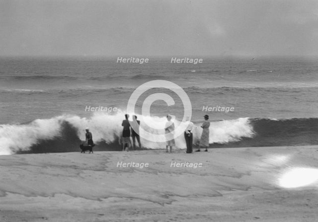 Unidentified group of people, possibly members of the Jewett family, standing on the...c1911-1942. Creator: Arnold Genthe.