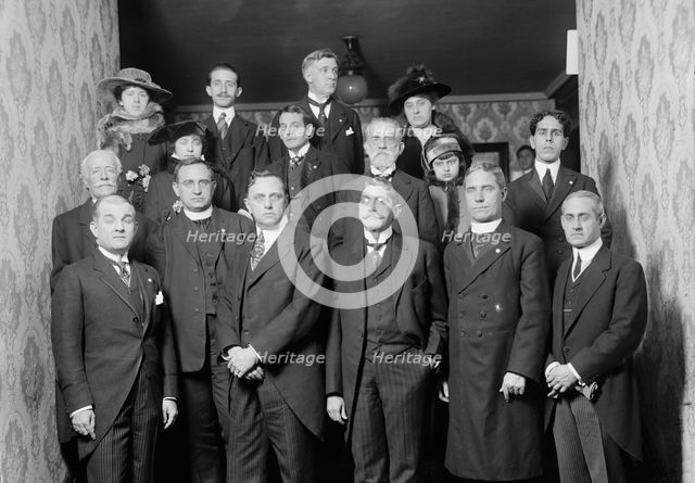 Unidentified Group On Entrance Stairway of John Barrett's Residence; 12 Men, 3 Women, Child, 1915.  Creator: Harris & Ewing.