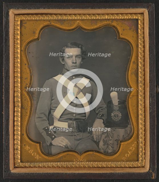 Unidentified soldier of 7th New York Infantry Regiment in uniform graphic /, between 1861 and 1863. Creator: Rufus Anson.