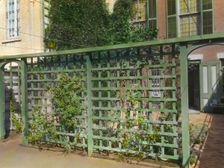 Unidentified townhouse garden, probably in New York, New York, c1922. Creator: Frances Benjamin Johnston