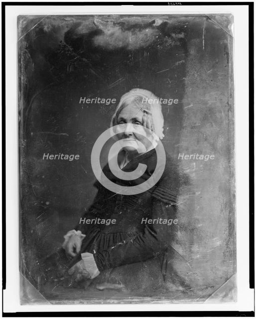Unidentified woman, half-length portrait, three-quarters to the left..., between 1851 and 1860. Creator: Mathew Brady.