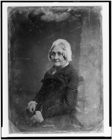 Unidentified woman, half-length portrait, three-quarters to the left..., between 1851 and 1860. Creator: Mathew Brady