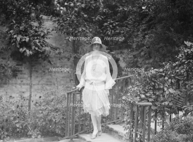 Unidentified woman, standing outdoors, c1920s. Creator: Arnold Genthe.