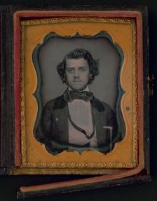 Unidentified young man, half-length portrait, facing front, ca. 1855. Creator: Francis Grice