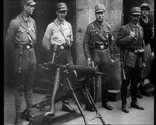 Uniformed Nazis Standing Next to a Machine Gun, 1933. Creator: British Pathe Ltd