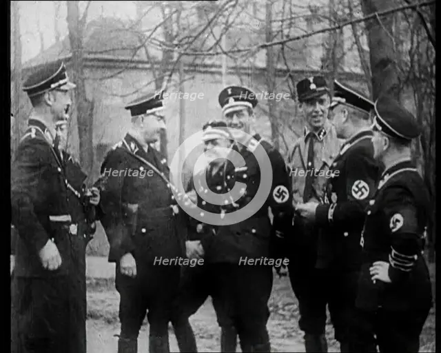 Uniformed Nazis Talking to Each Other, 1933. Creator: British Pathe Ltd.