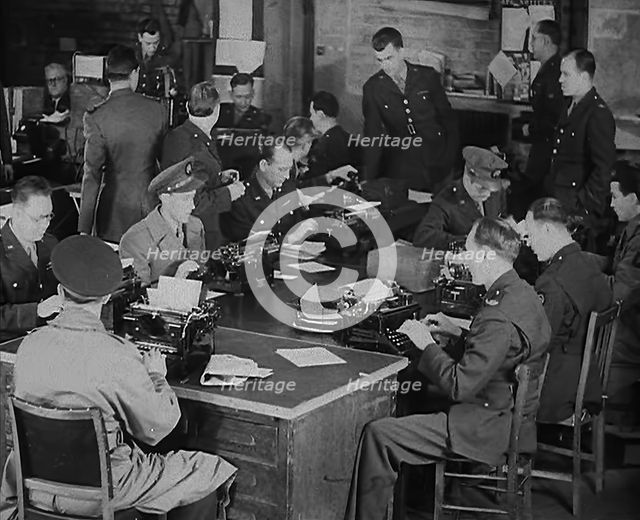 Uniformed Press Officers Working, 1943. Creator: British Pathe Ltd.