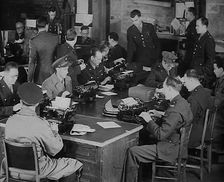 Uniformed Press Officers Working, 1943. Creator: British Pathe Ltd