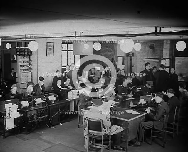 Uniformed Press Officers Working, 1943. Creator: British Pathe Ltd.