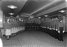 Uniformed staff of the Odeon cinema, Leicester Square, London, 1937. Artist: J Maltby