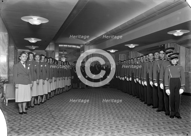 Uniformed staff of the Odeon cinema, Leicester Square, London, 1937. Artist: J Maltby