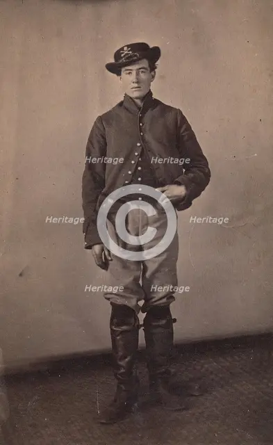Union Cavalry Soldier with Pistol in Holster, 1861-65. Creator: Tappin's Photograph Art Gallery.