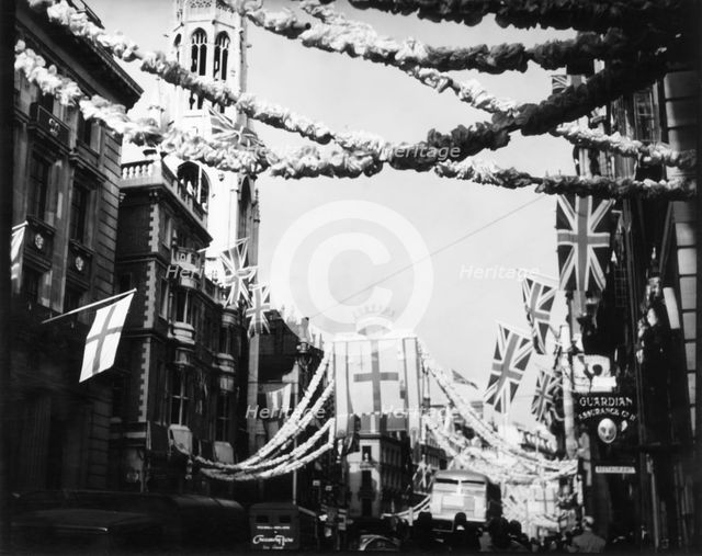 Union flags and decorations, coronation of Queen Elizabeth II, Fleet Street, London, June 1953.  Creator: Arthur Charles Kirby Ware.