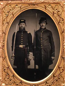 Union Officer and Private, Standing at Attention, with Sword and Rifle with Fixed Bayo..., 1861-65. Creator: Unknown
