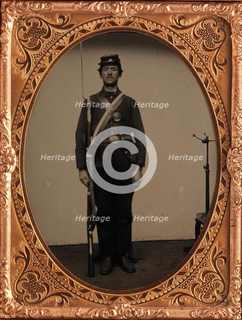 [Union Soldier Holding Rifle, with Photographer's Posing Stand], 1861-65. Creator: Unknown.