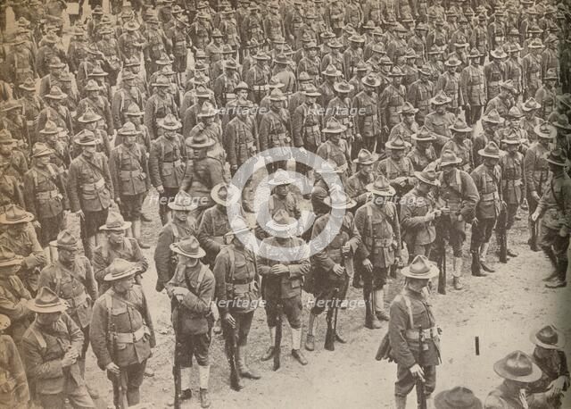 'United States Troops on parade before their march through London on August 15, 1917, when they were Artist: Unknown.