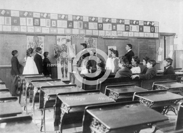 United States Indian School, Carlisle, Pa.: Class studying anatomy, 1901. Creator: Frances Benjamin Johnston.