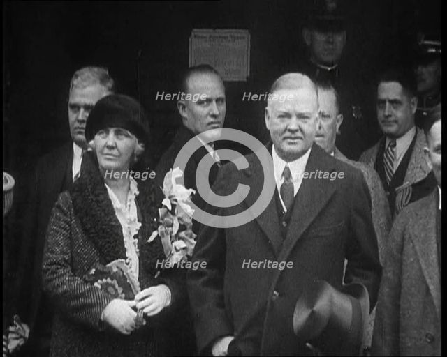 United States of America's President Herbert Clark Hoover Emerging from a Building with the..., 1930 Creator: British Pathe Ltd.