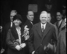 United States of America's President Herbert Clark Hoover Emerging from a Building with the..., 1930 Creator: British Pathe Ltd