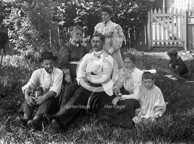 Unknown family portrait, c1900s. Creator: Robert Augustus Henry L'Estrange.