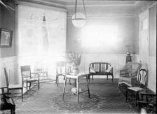 Unknown interior of Victorian family home with fine furniture, brass bed, c1900s.. Creator: Robert Augustus Henry L'Estrange