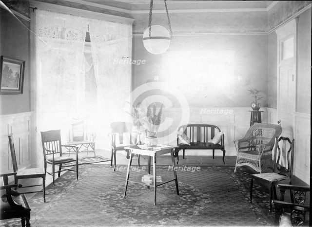 Unknown interior of Victorian family home with fine furniture, brass bed, c1900s.. Creator: Robert Augustus Henry L'Estrange.
