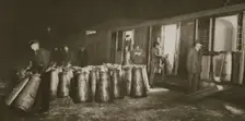 Unloading a milk train, London, 20th century. Creator: Unknown