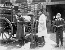 Unloading at Billingsgate Market, London, 1893. Creator: Paul Martin