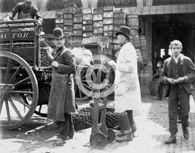 Unloading at Billingsgate Market, London, 1893. Creator: Paul Martin.