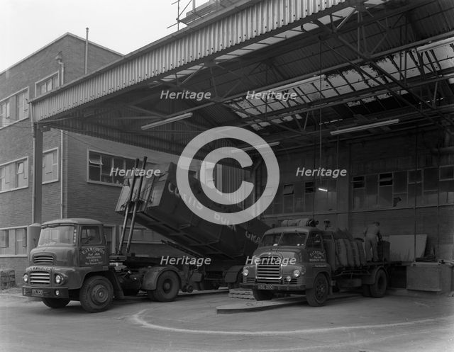 Unloading and loading lorries, Spillers Animal Foods, Gainsborough, Lincolnshire, 1961.  Artist: Michael Walters