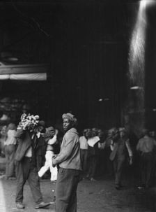 Unloading bananas, New Orleans, between 1920 and 1926. Creator: Arnold Genthe