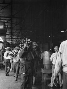 Unloading bananas, New Orleans, between 1920 and 1926. Creator: Arnold Genthe