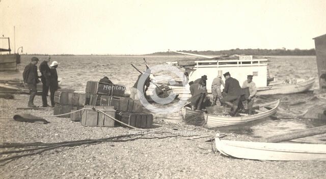 Unloading gasoline from boats on the Zee River during windy conditions, 1909. Creator: Vladimir Ivanovich Fedorov.