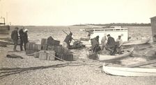 Unloading gasoline from boats on the Zee River during windy conditions, 1909. Creator: Vladimir Ivanovich Fedorov
