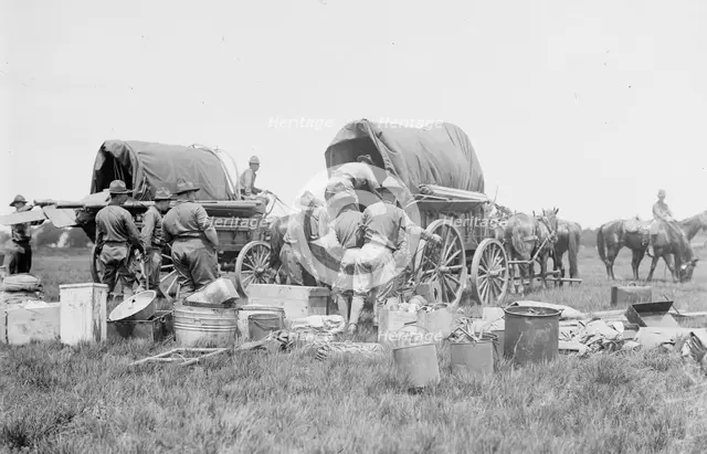 Unloading supplies, N.Y.N.G., between c1910 and c1915. Creator: Bain News Service.